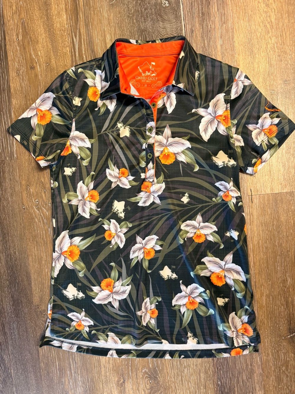 Women's Black Floral Polo with Orange Accents